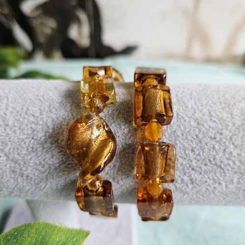 Armbänder große Glassteine braun