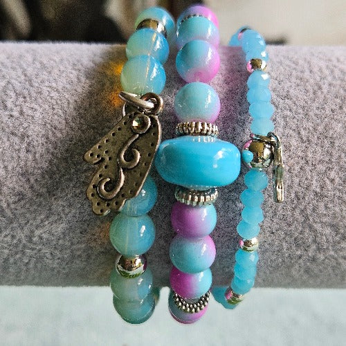 Armbänder Perlen 3er-Set hellblau / rosa Anhänger