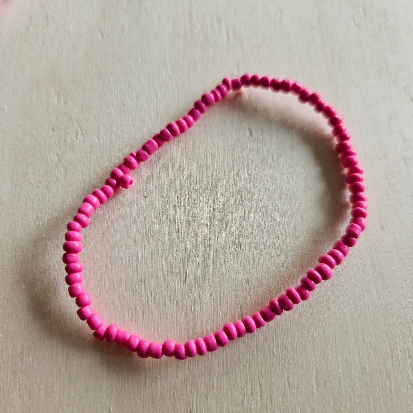 Armbänder 4 er Set Rosa/Pink mit bunten Perlen