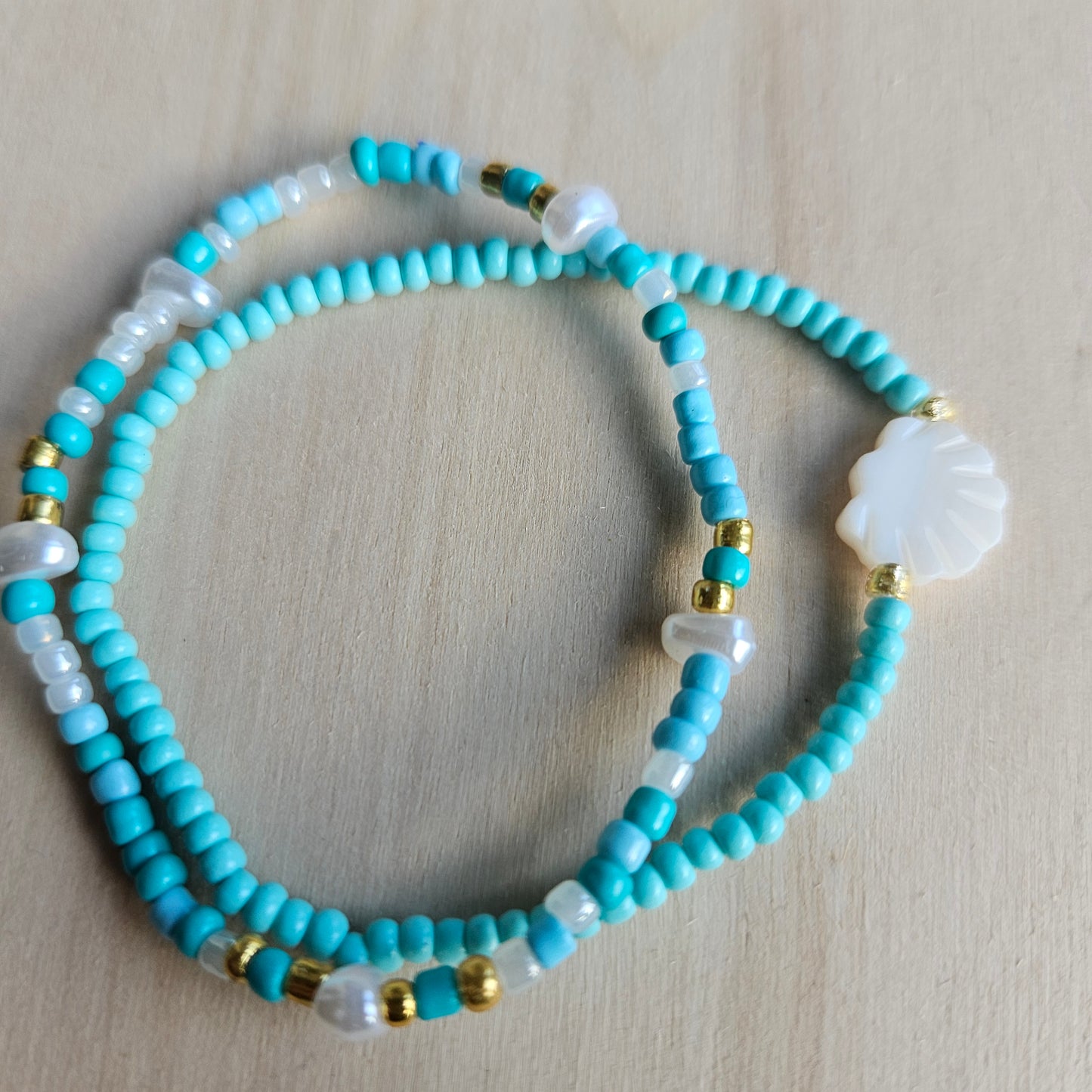 Armbänder Hellblau Perlen mit Fisch 4 er Set