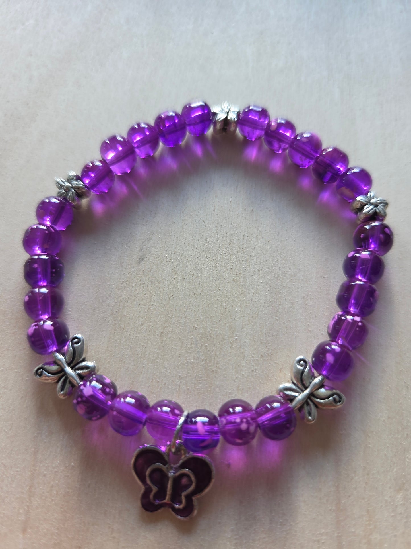 Armbänder Mit Blumen Perle Lila und Schmetterling 4 er Set