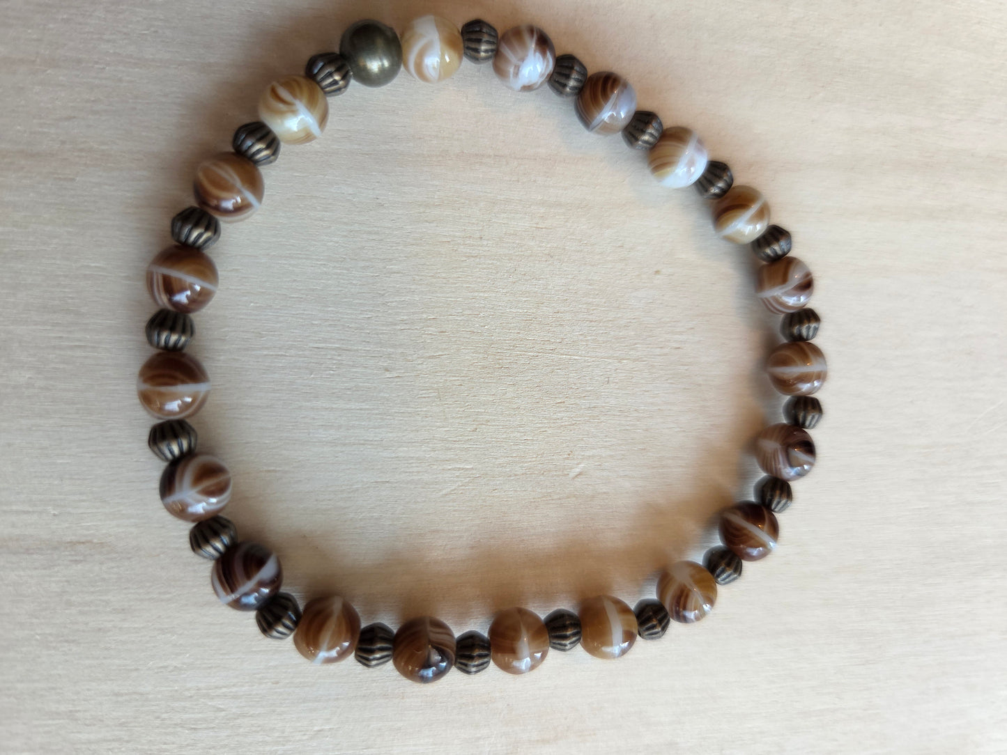 Armbänder Perlen braun 3 er Set mit Anhänger