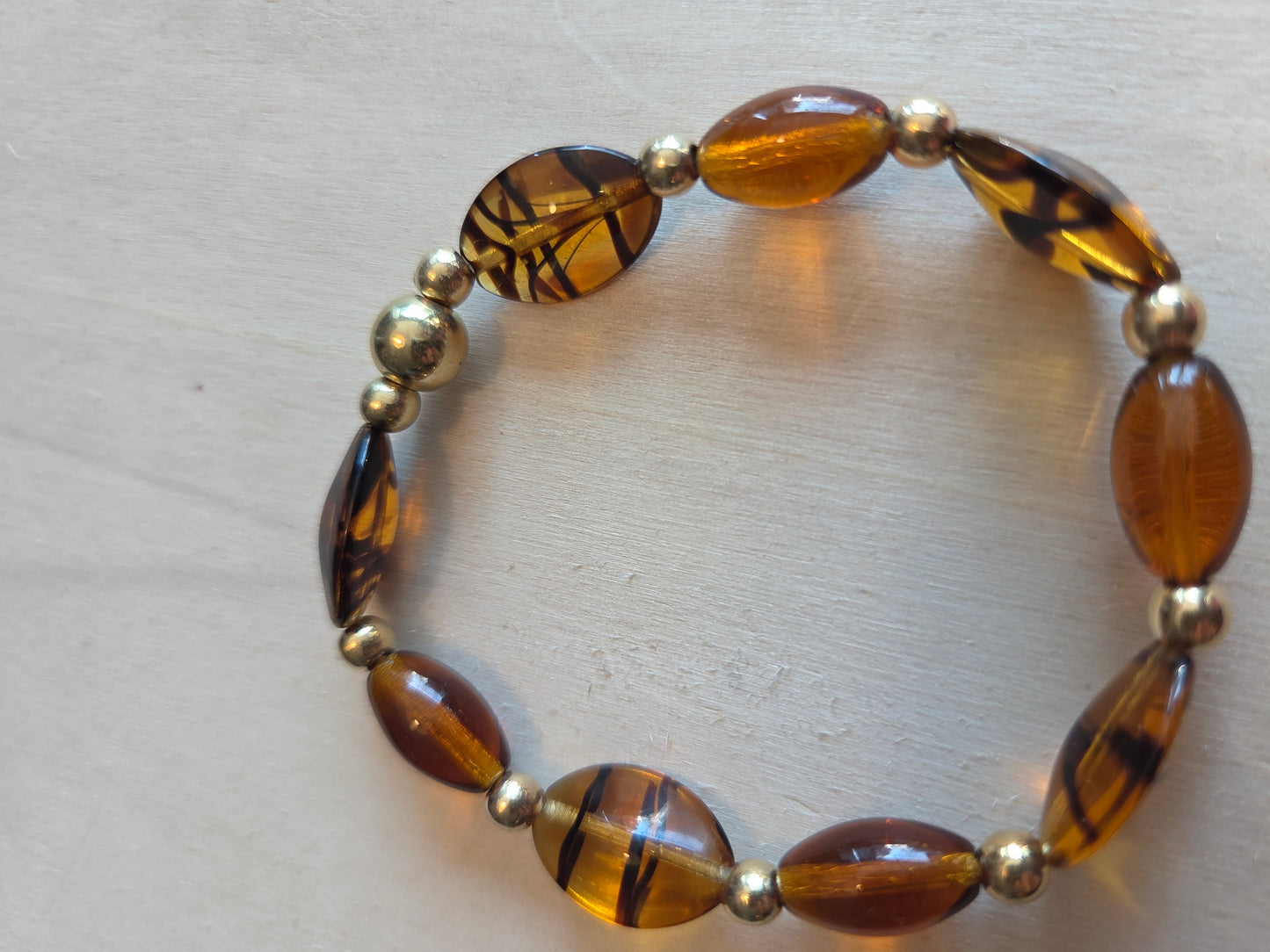 Perlenarmbänder braun Glas Bernsteinfarbig