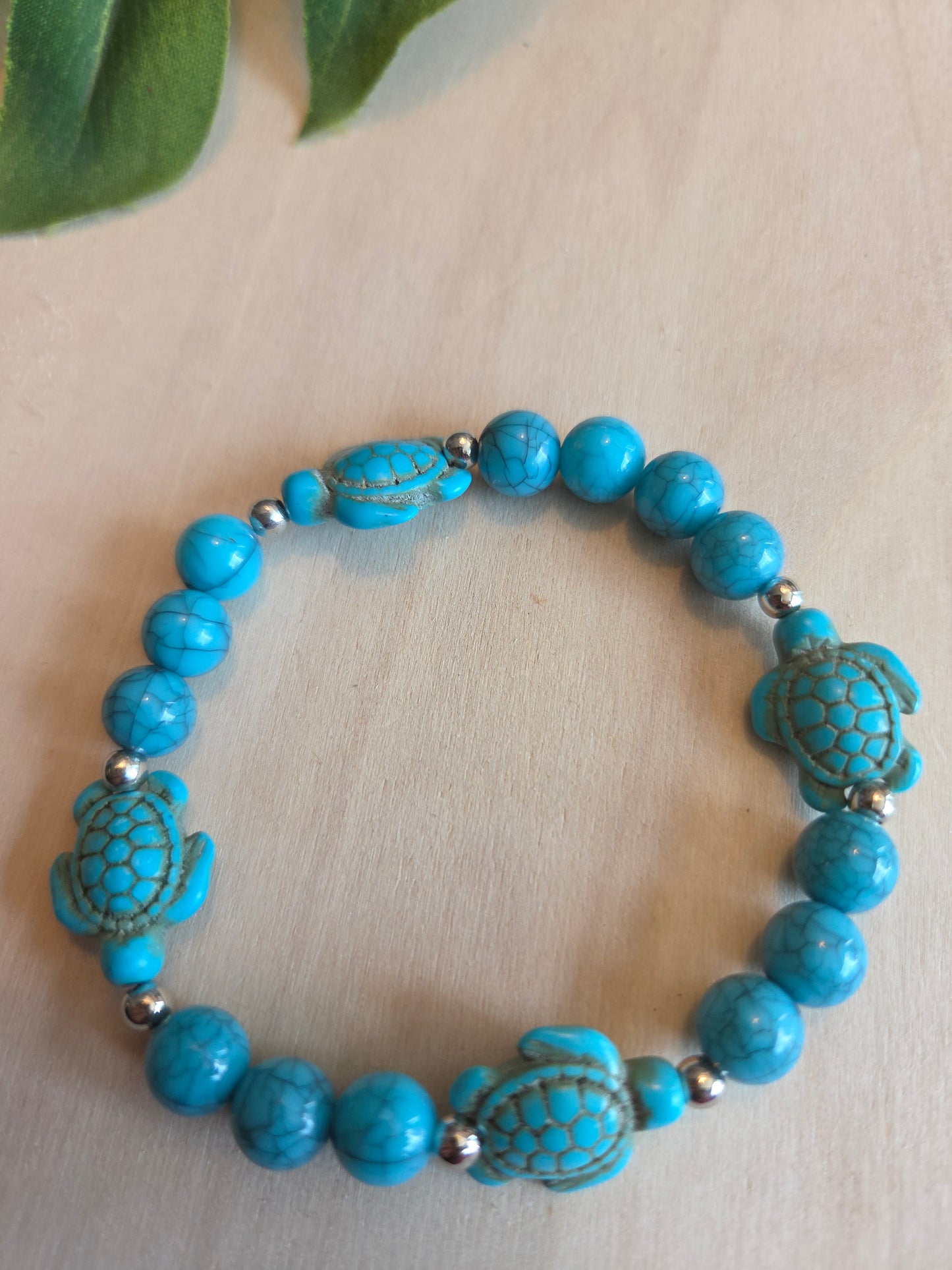 Armbänder Perlen hellblau mit Schildkröte 4 er Set