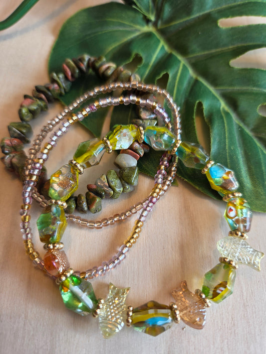 Armbänder Perlen  grün mit Fischen