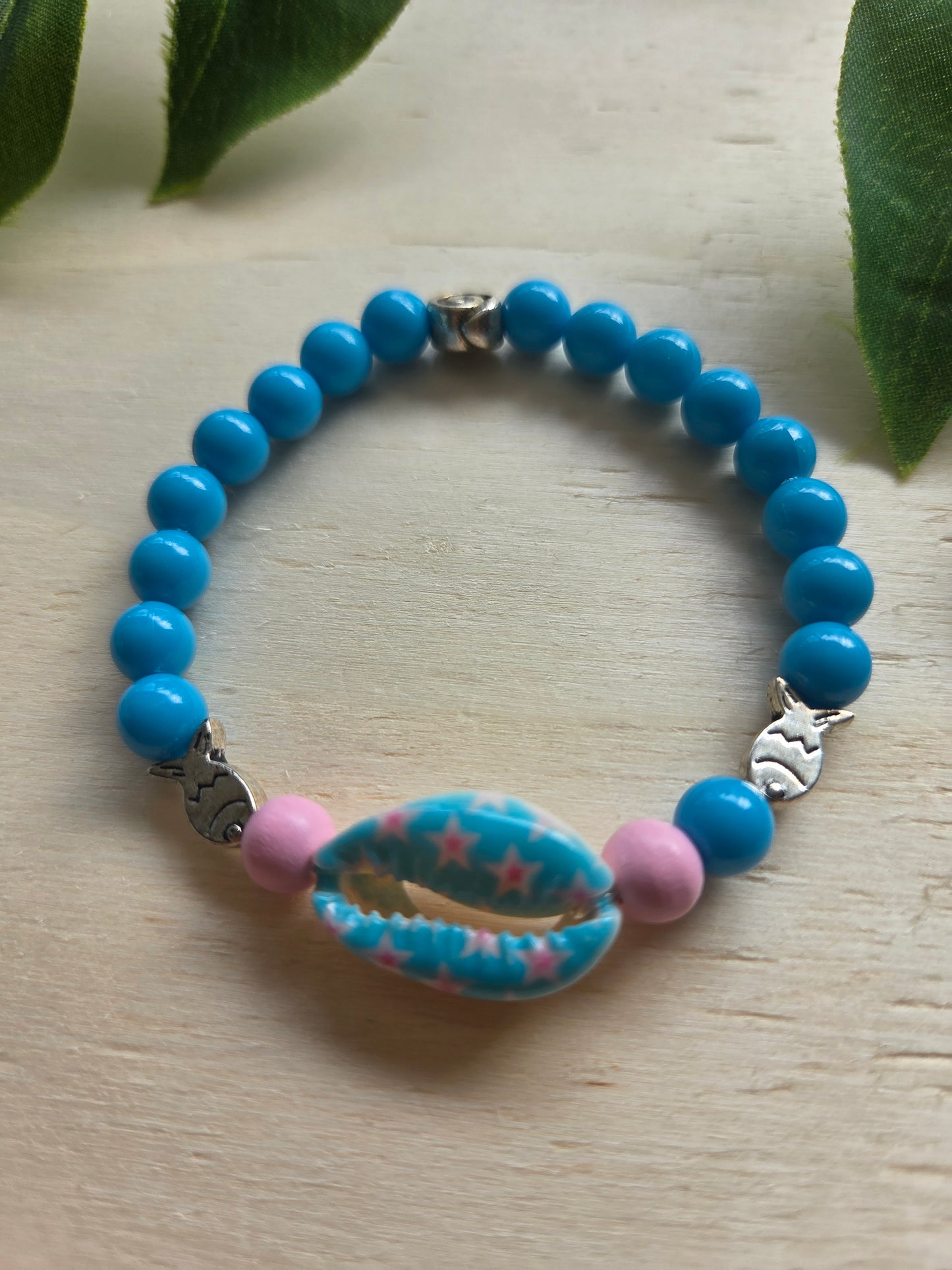 Armbänder mit Muschel bunt 4er-Set