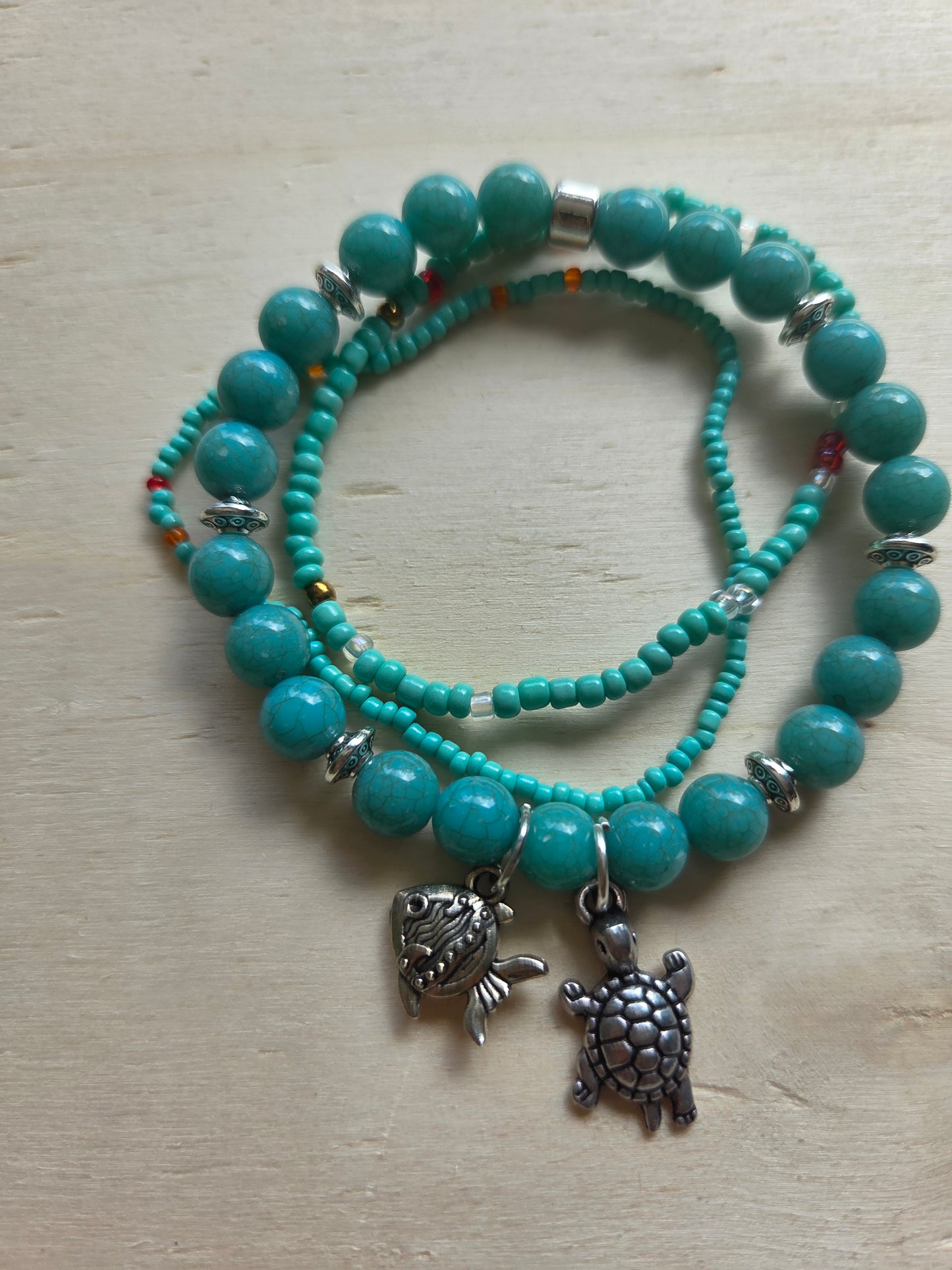 Armbänder mit AH Fisch/Schildkröte blau 4er -Set