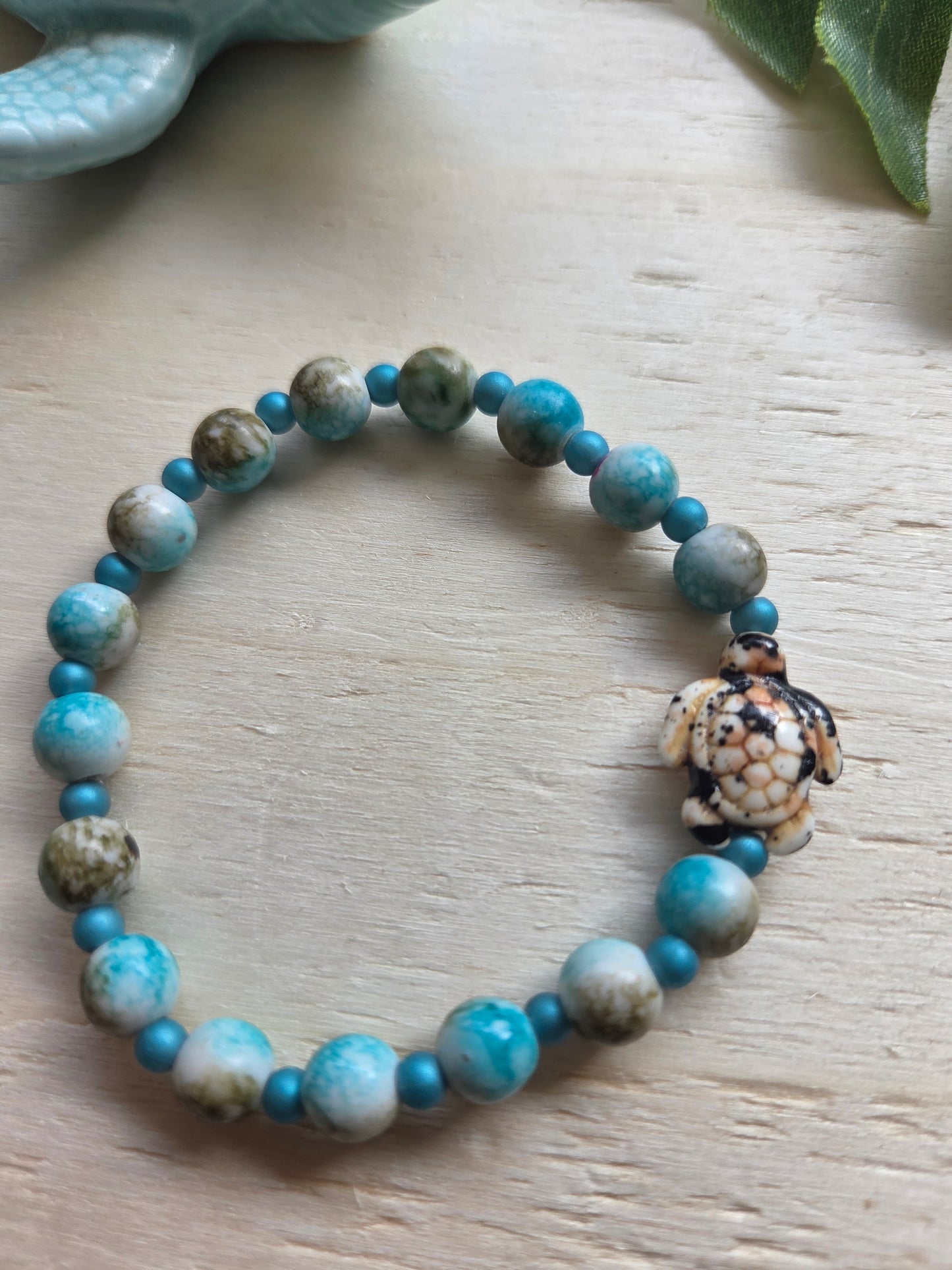 Armbänder blau mit AH Schildkröte 4er-Set