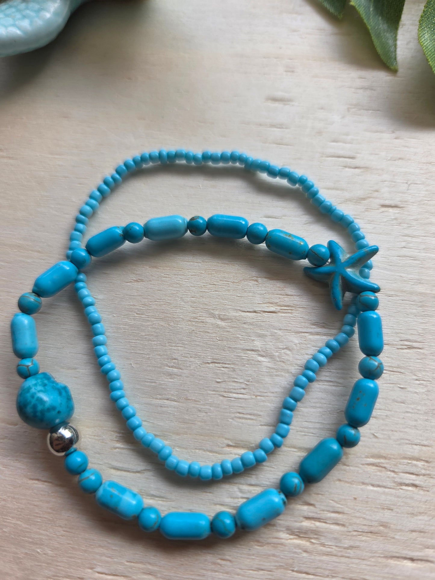 Armbänder blau mit AH Schildkröte 4er-Set
