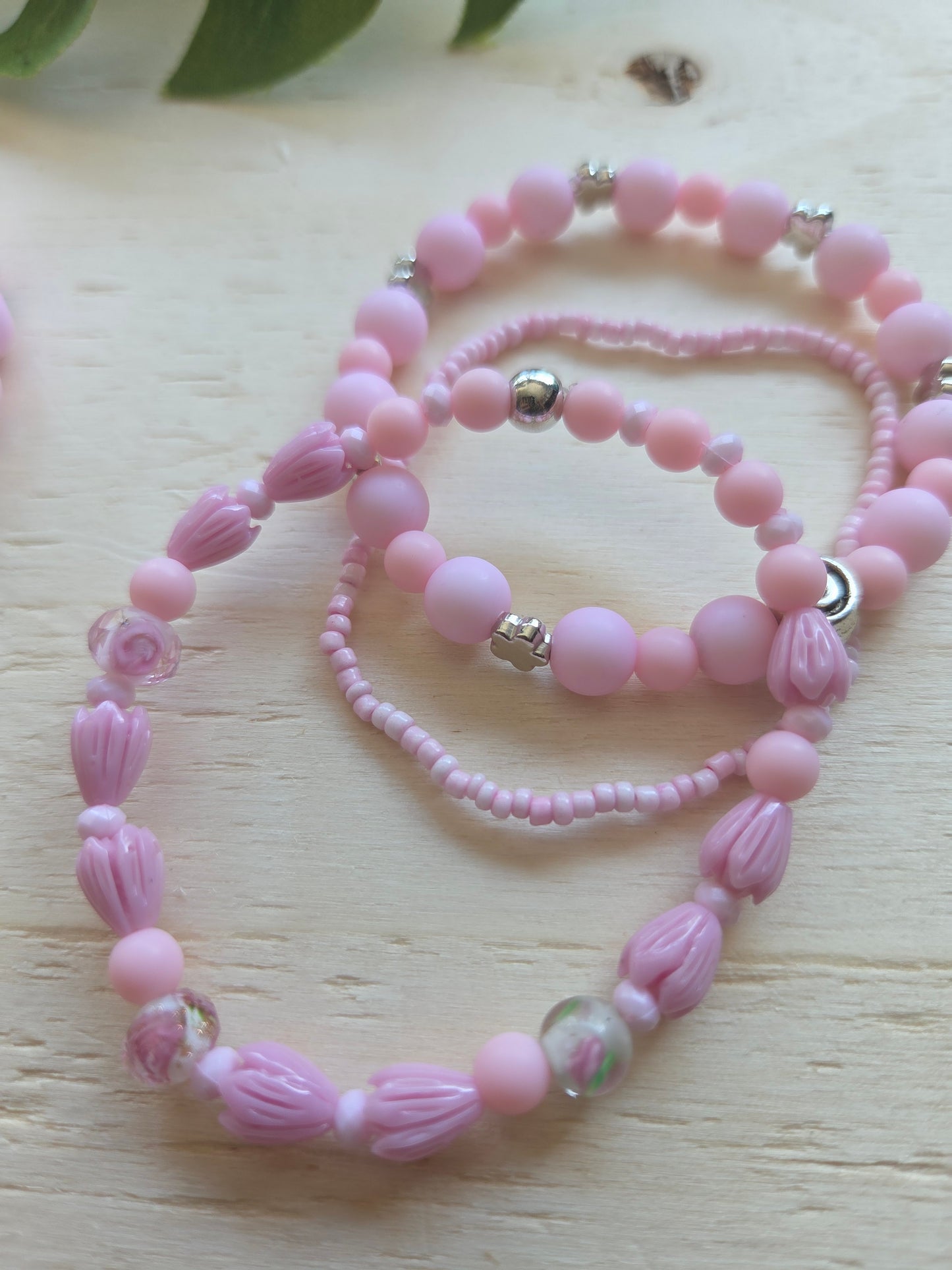 Armbänder Rosa mit Blüten Perlen 4er-Set