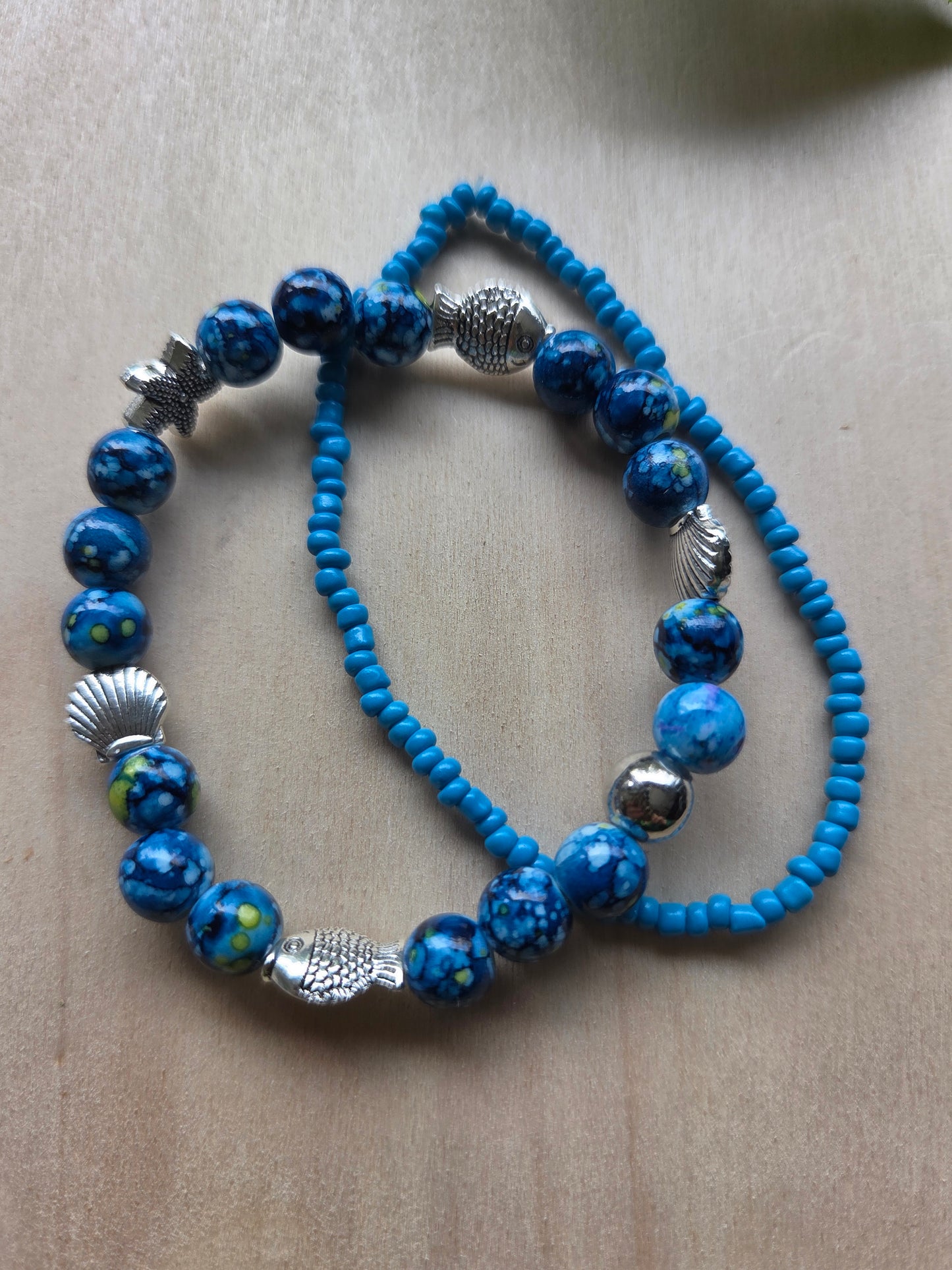 Armbänder mit AH Fisch/Muschel hellblau 3er-Set