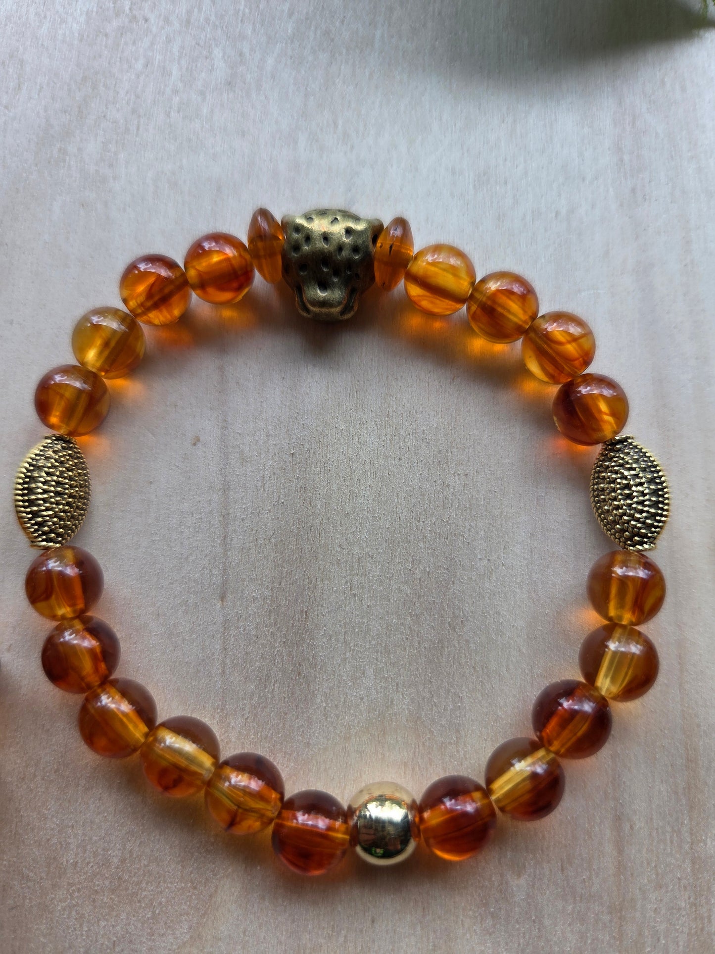Armbänder mit Leo Kopf Perle braun Glas 3er- Set