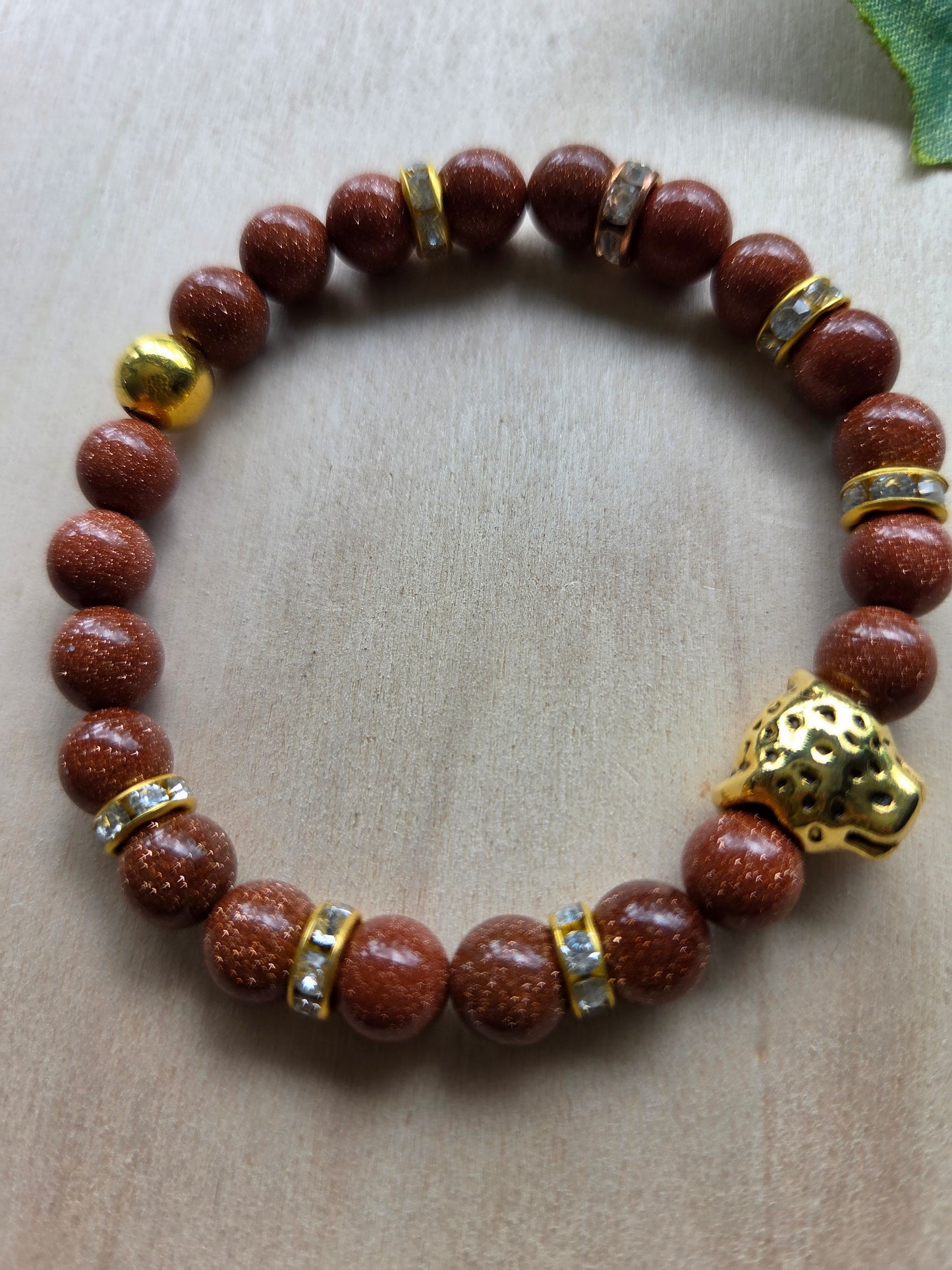 Armbänder braun mit Leo Kugel 4 er- Set
