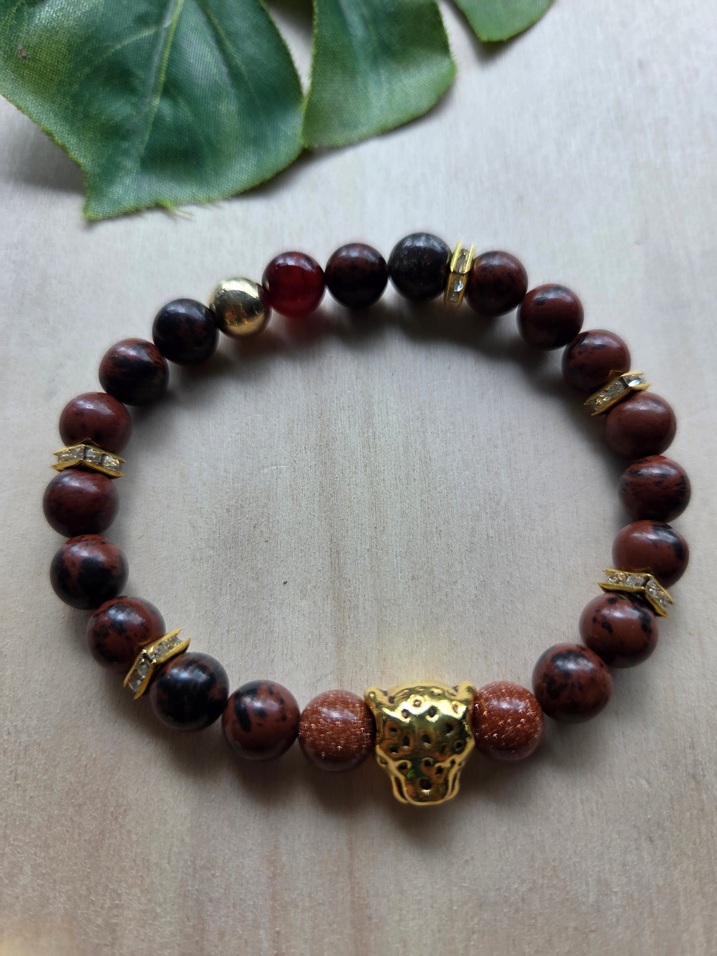 Armbänder mit Leo Kopf braun 4er- Set