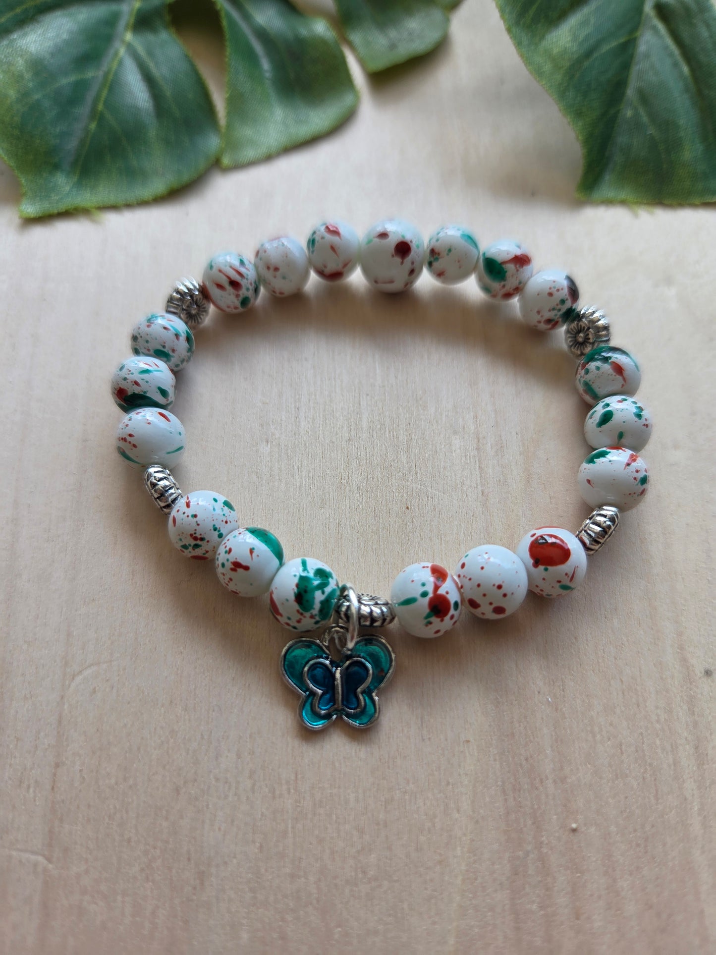 Armbänder weiß/grün mit AH Schmetterling 3er- Set