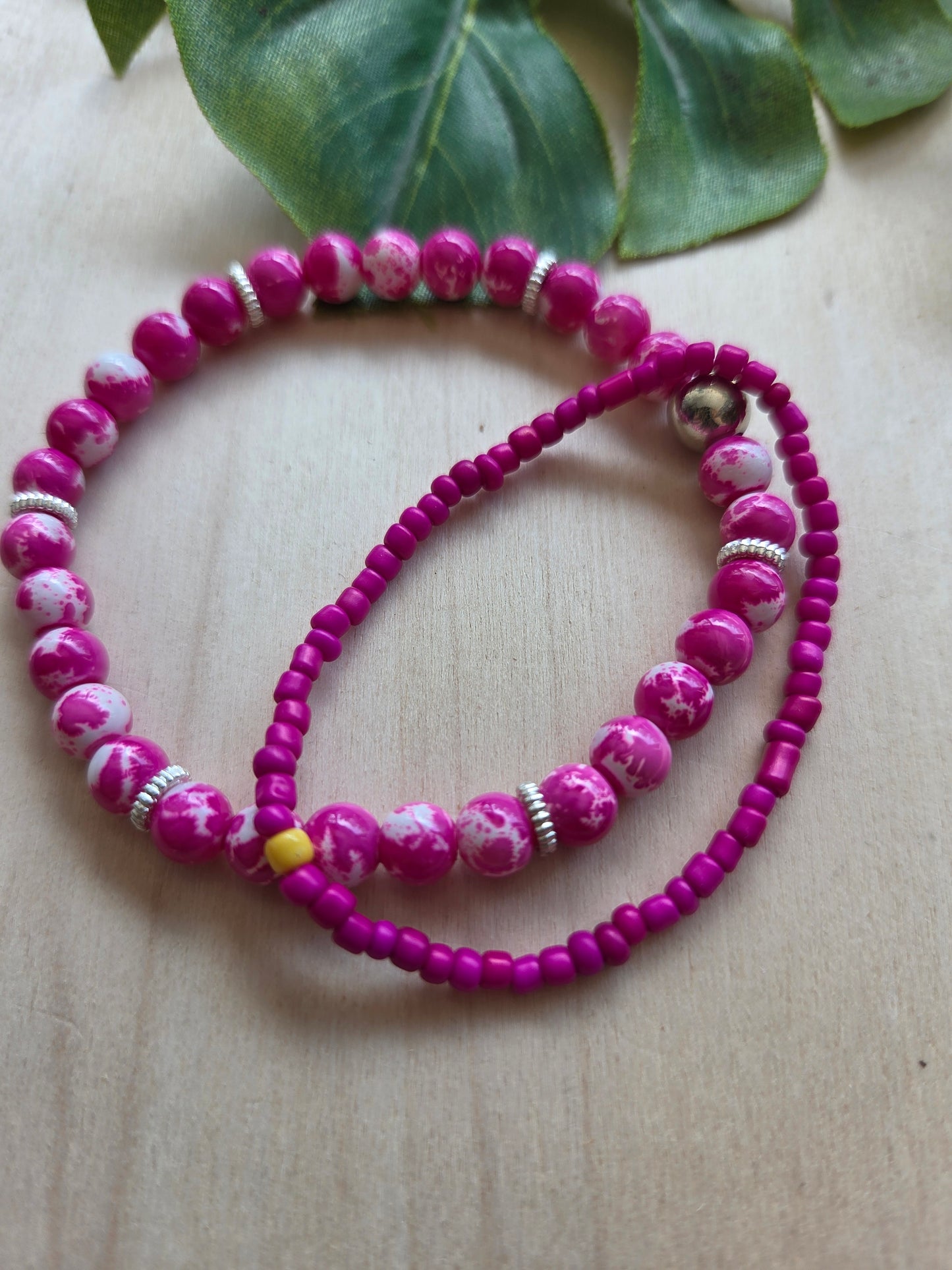 Armbänder Pink mit Blüten Perlen und Herz