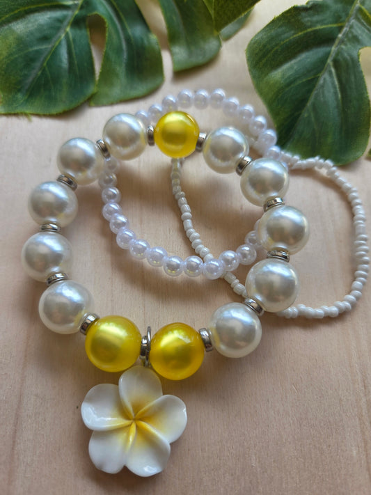 Armbänder mit Hibiskusblüte weiss/gelb 3 er Set