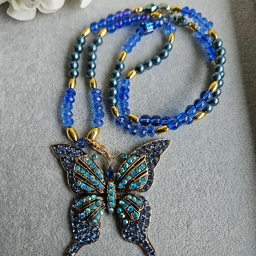 Halskette Perlen blau Schmetterling Strass