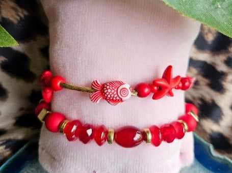 Armbänder rot mit Perlen