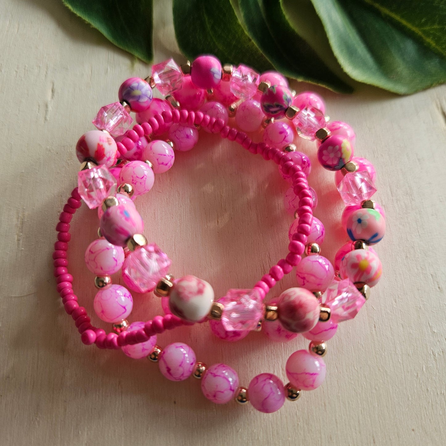 Armbänder 4 er Set  Rosa/Pink mit bunten Perlen