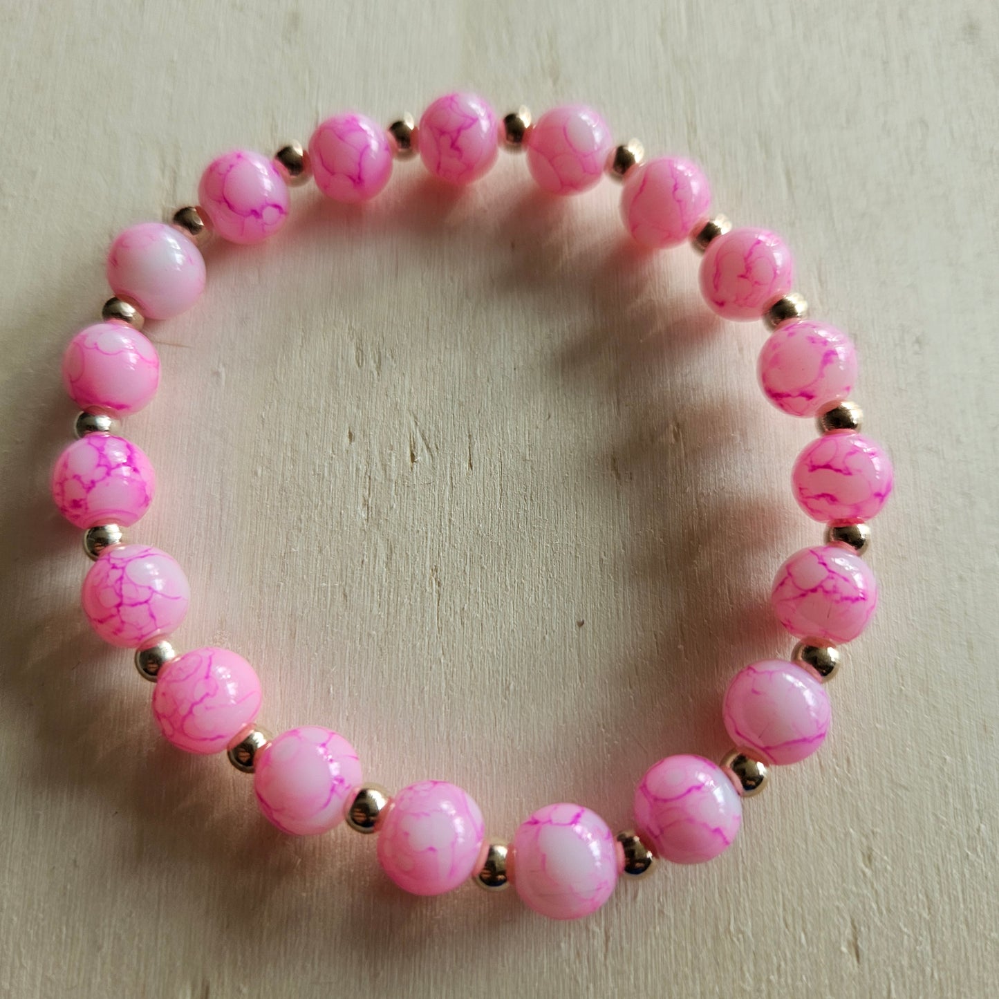 Armbänder 4 er Set  Rosa/Pink mit bunten Perlen