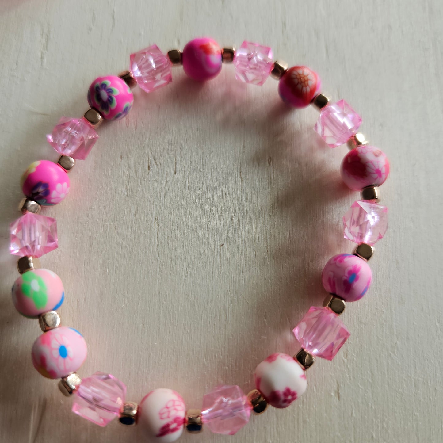 Armbänder 4 er Set  Rosa/Pink mit bunten Perlen