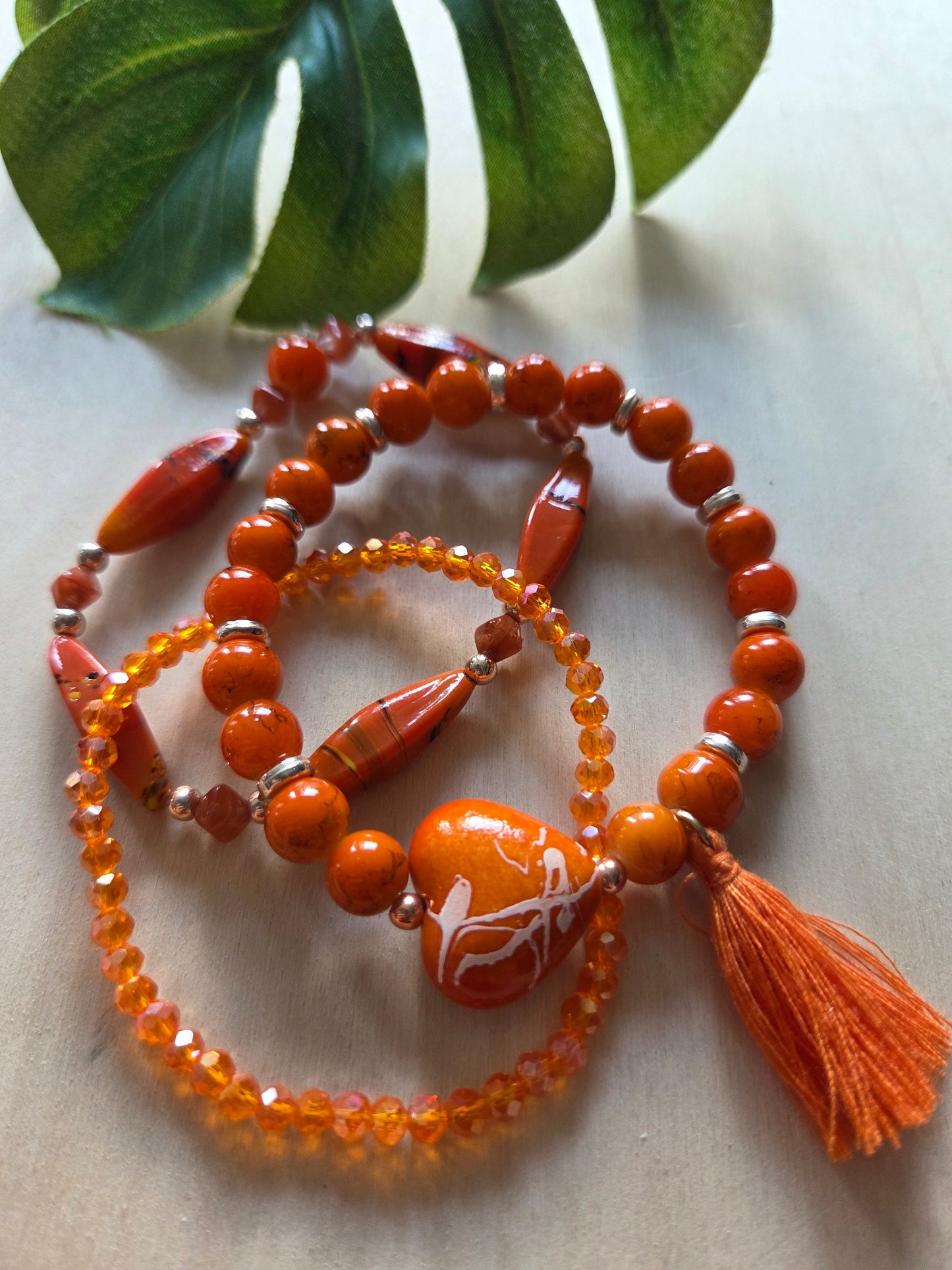 Armbänder   Stein/Perlmutt Orange mit Herz 4 er Set