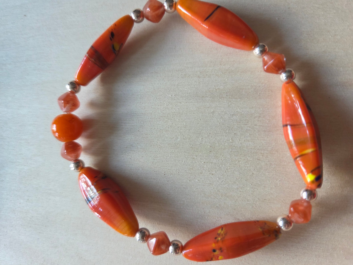 Armbänder   Stein/Perlmutt Orange mit Herz 4 er Set