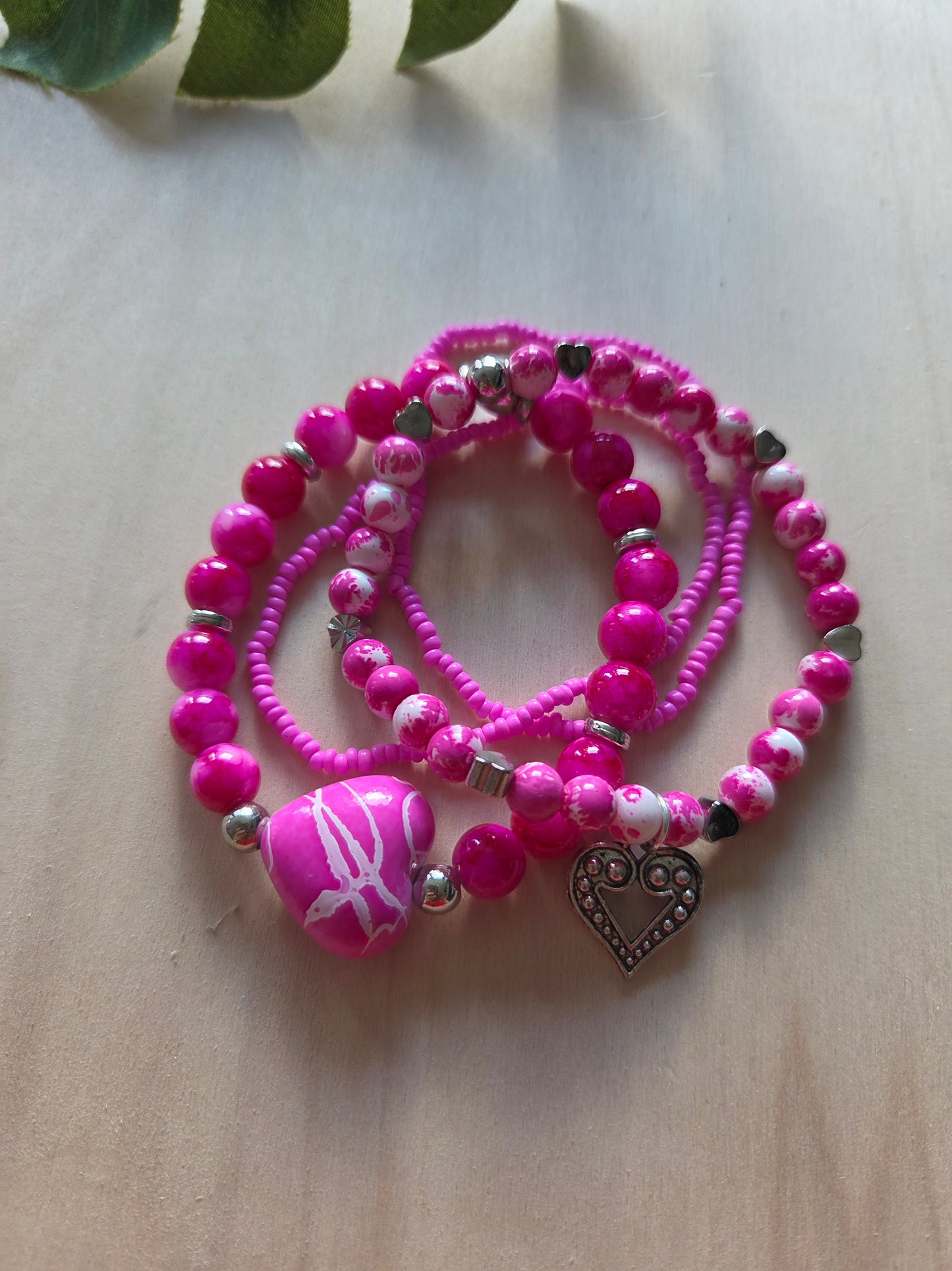 Armbänder 4 er Set Rosa/Pink mit Herz