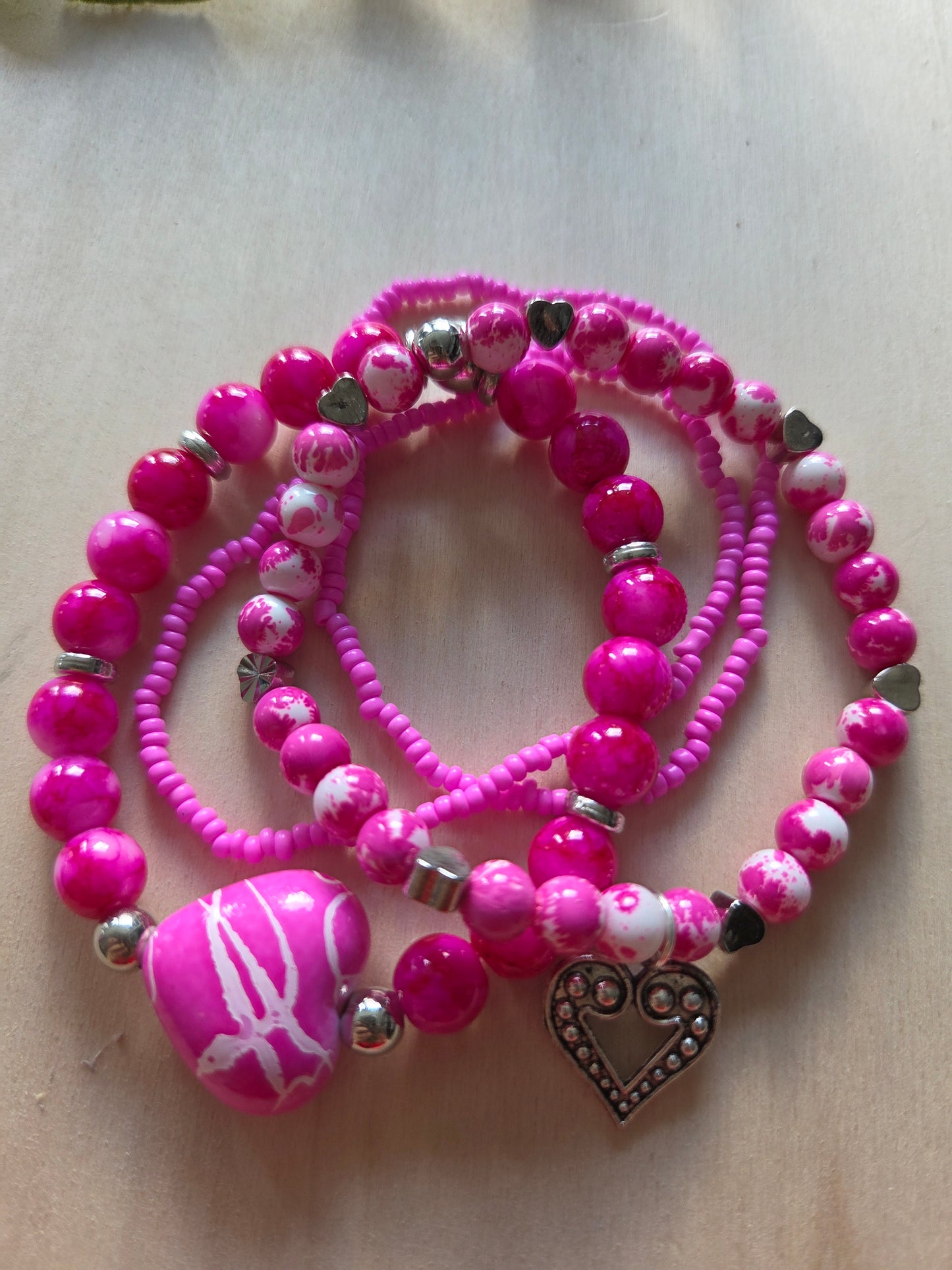 Armbänder 4 er Set Rosa/Pink mit Herz