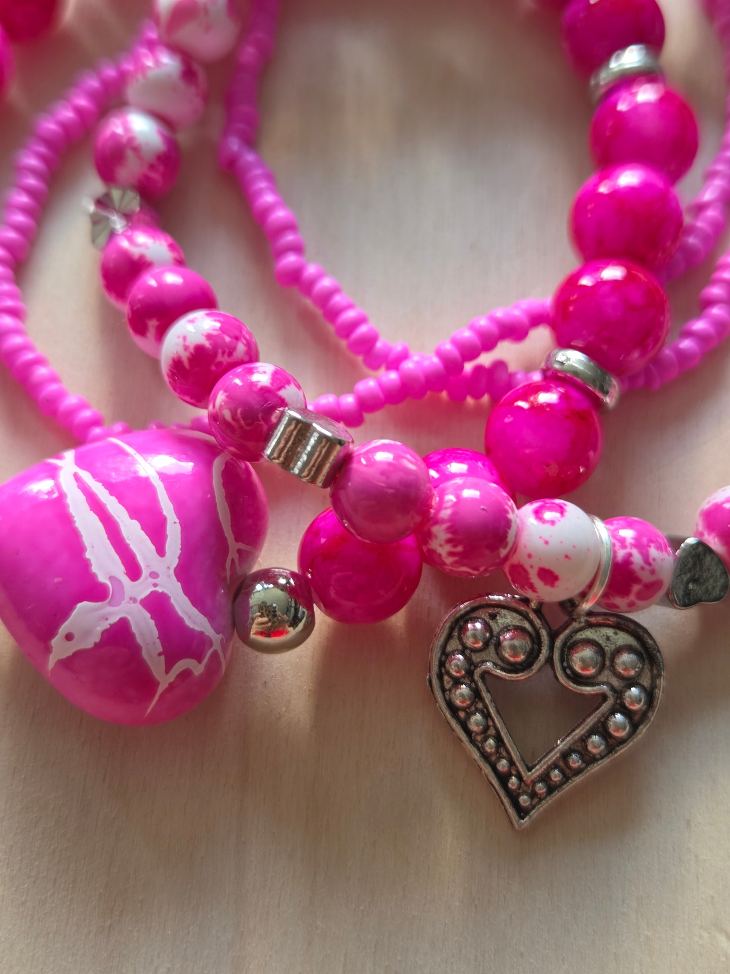 Armbänder 4 er Set Rosa/Pink mit Herz