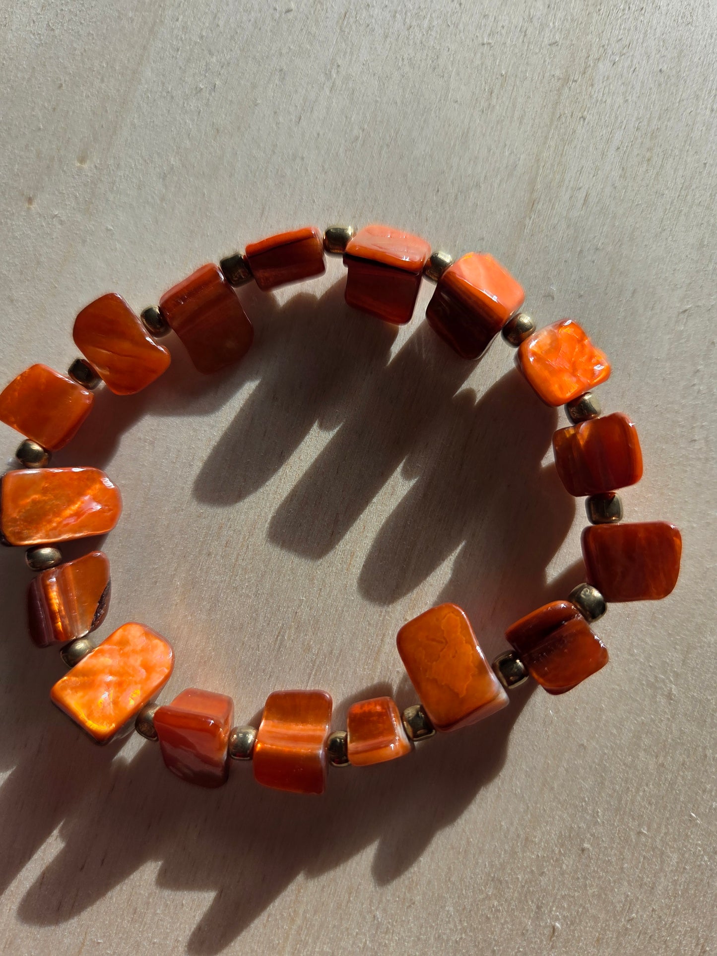 Armbänder   Stein/Perlmutt Orange mit Herz 4 er Set