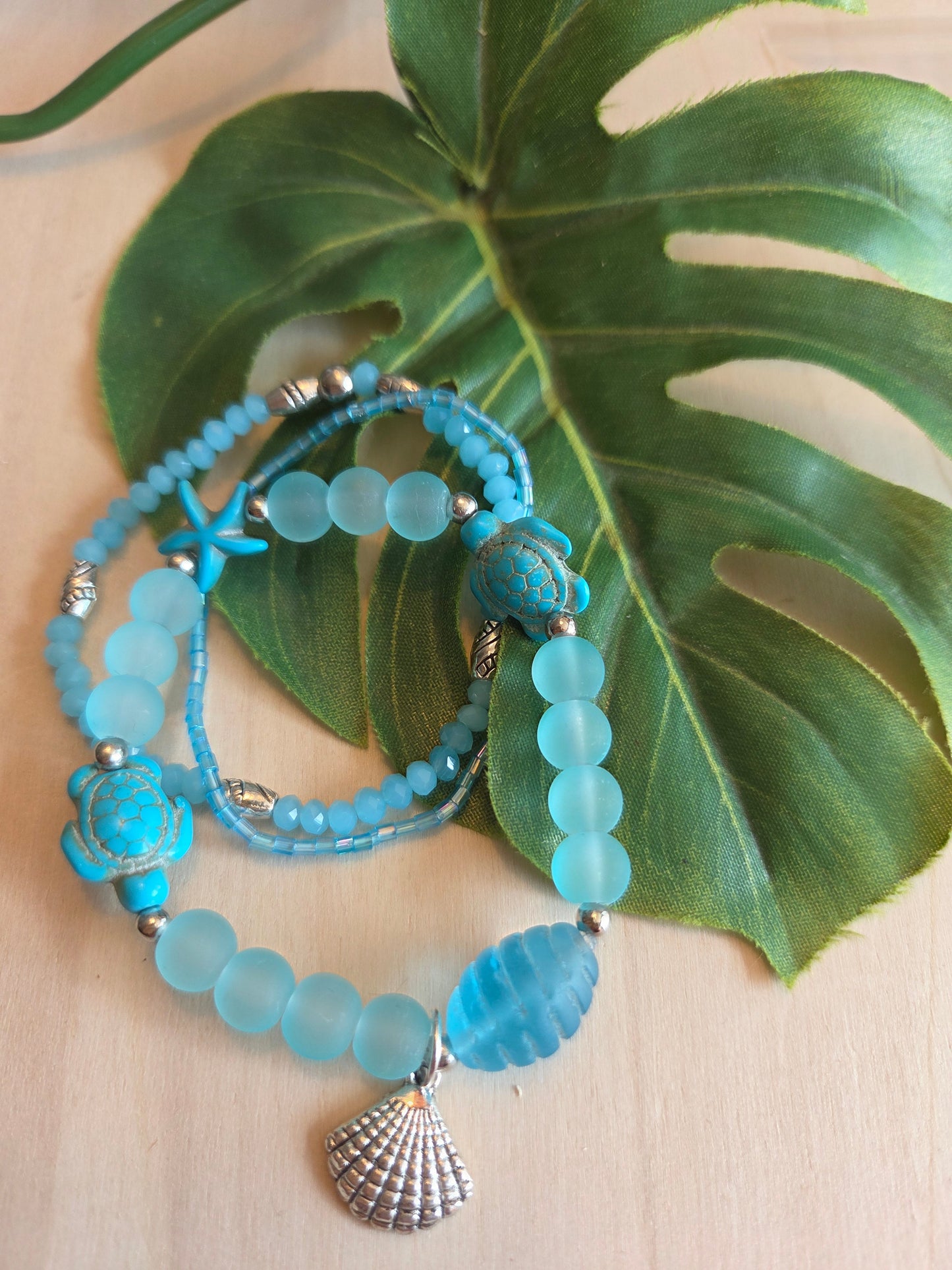 Armbänder Perle mit Schildkröte /Seestern hellblau 3 er Set