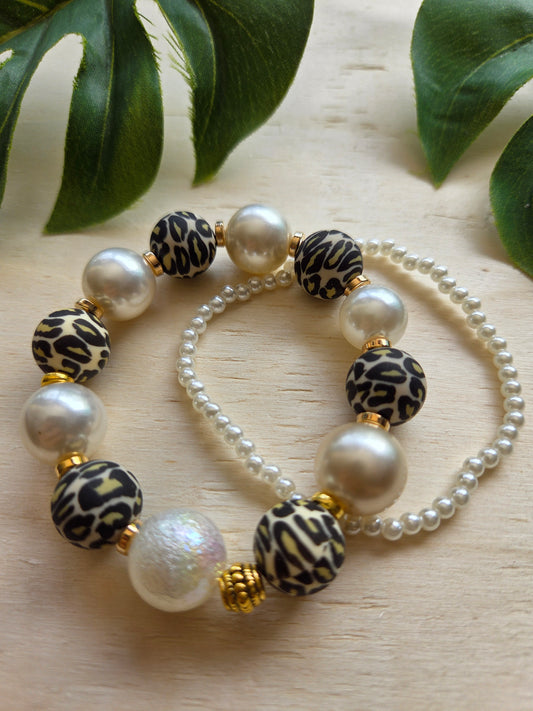 Armbänder mit Leo Perlen 2er-Set braun /weiß