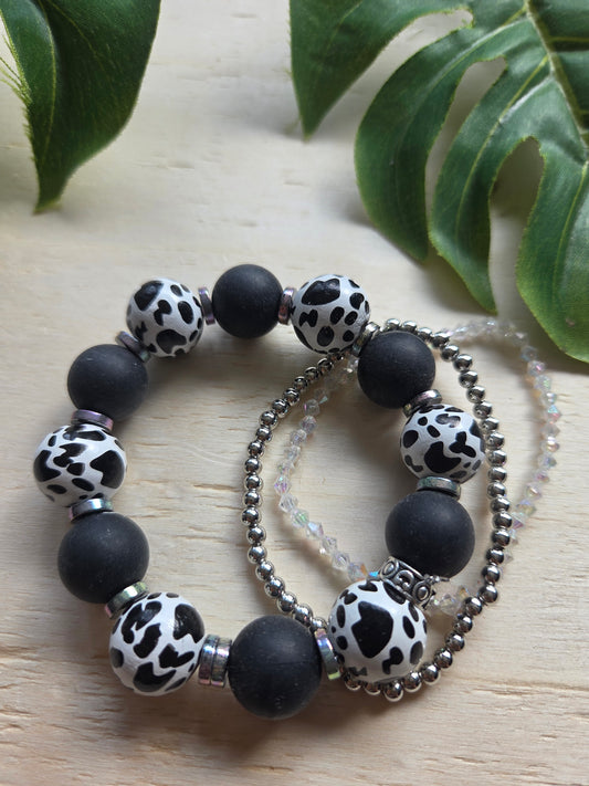 Armbänder mit Leo Kugeln schwarz/weiß 3er-Set