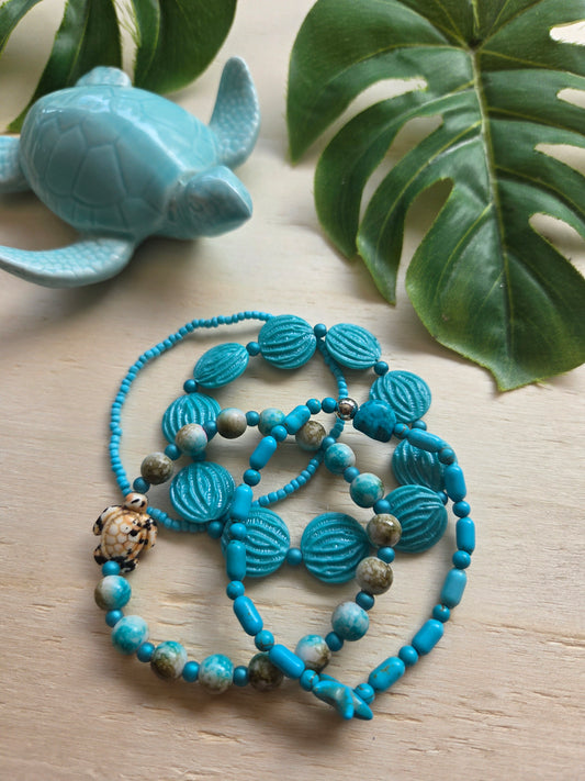 Armbänder blau mit AH Schildkröte  4er-Set