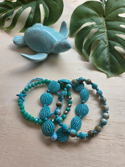 Armbänder Türkis 4er-Set Meeresmotive