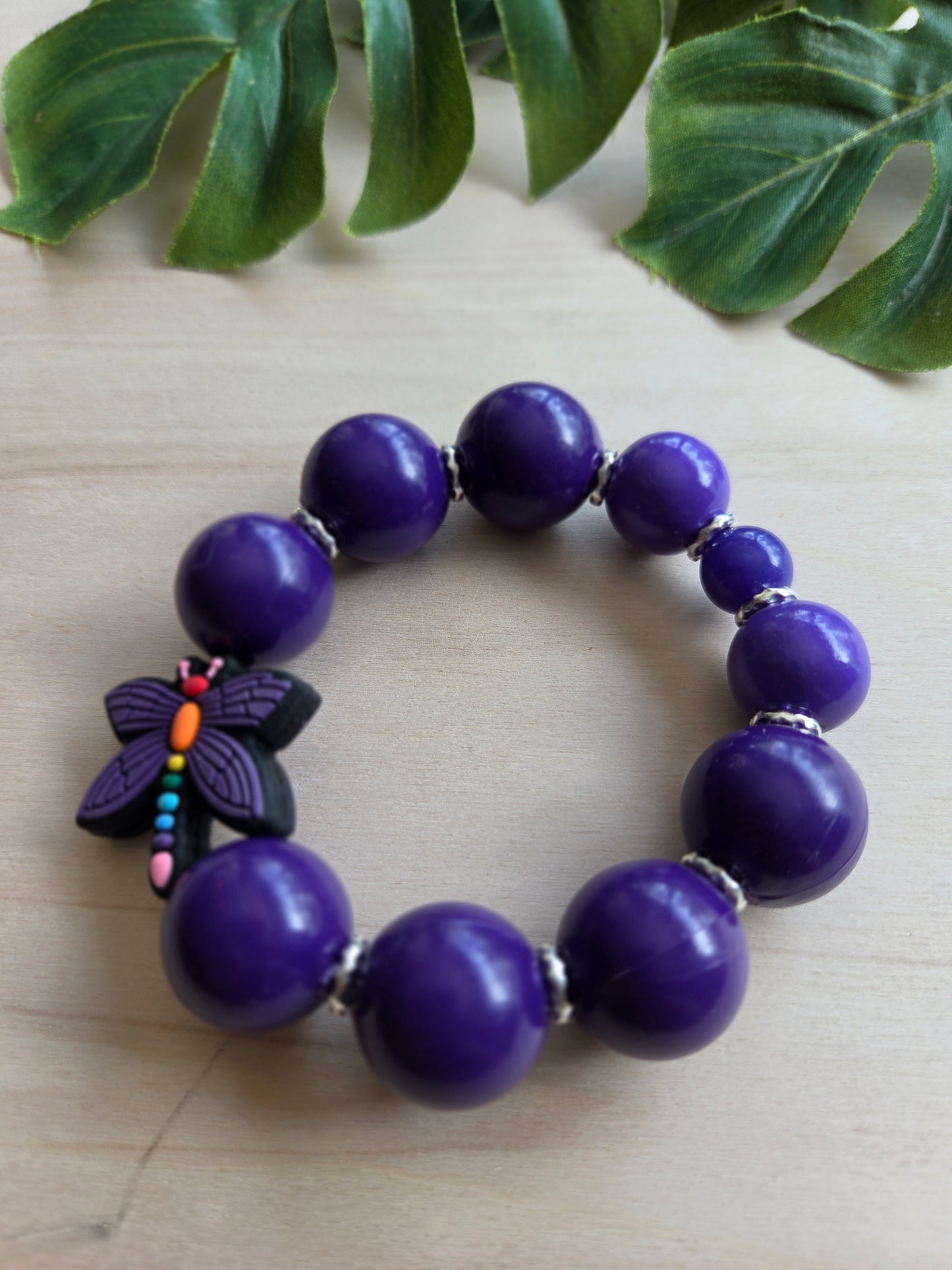 Armbänder Lila mit großem Schmetterling