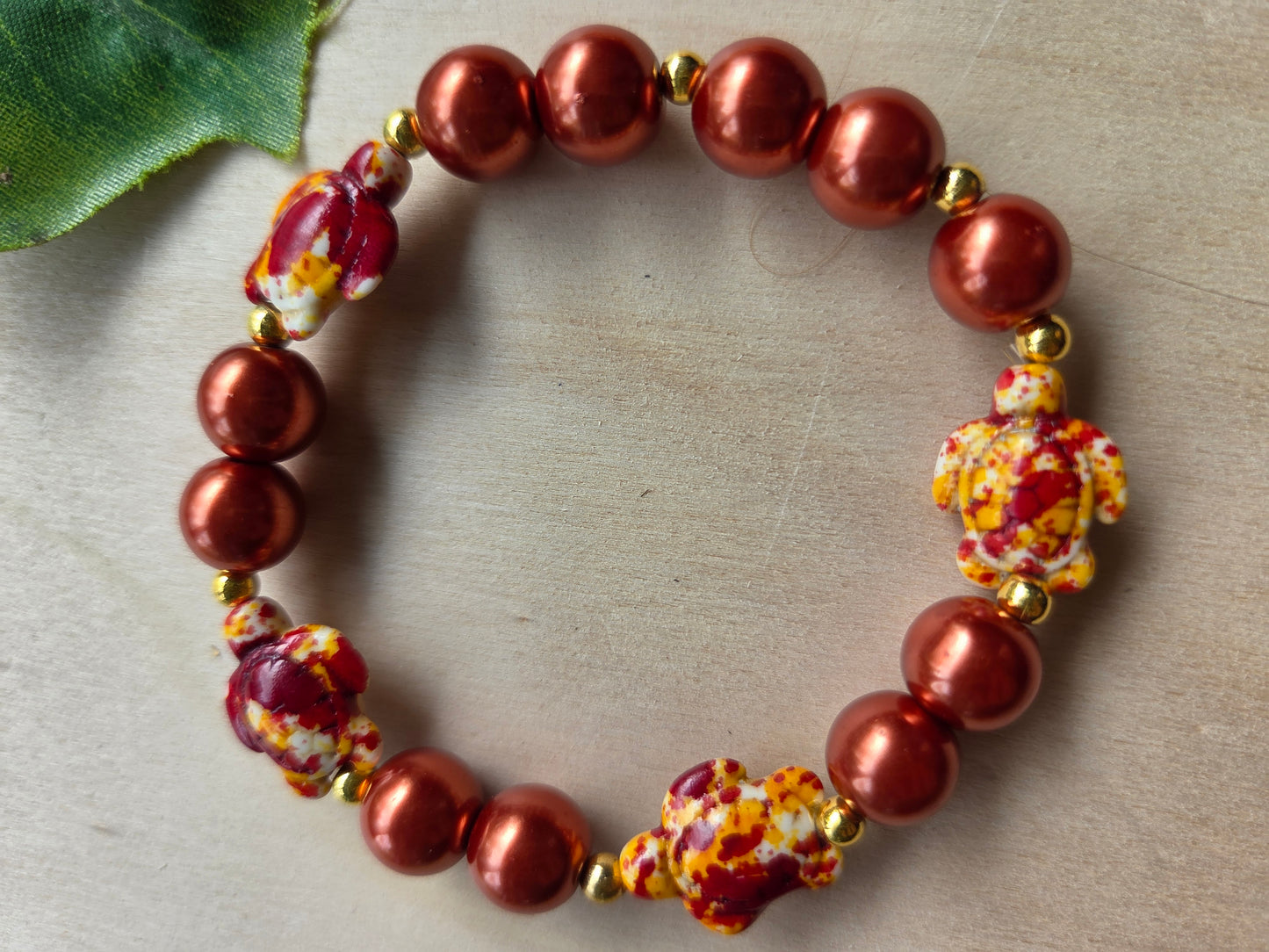 Armbänder Orange mit Schildkröte 3er-Set