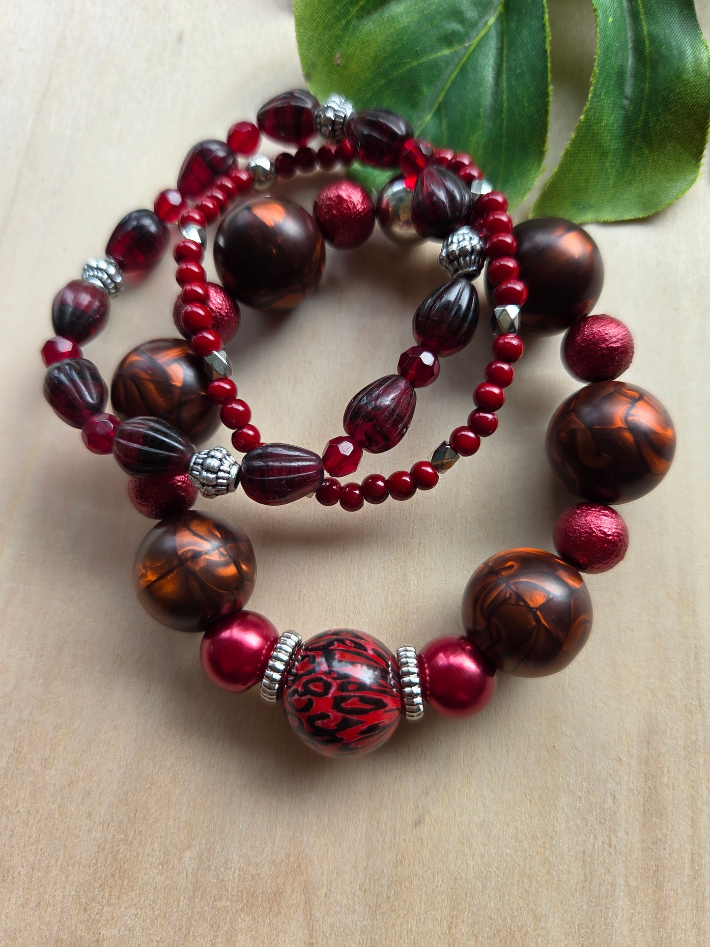 Armbänder mit Leo Kugel rot 3er-Set