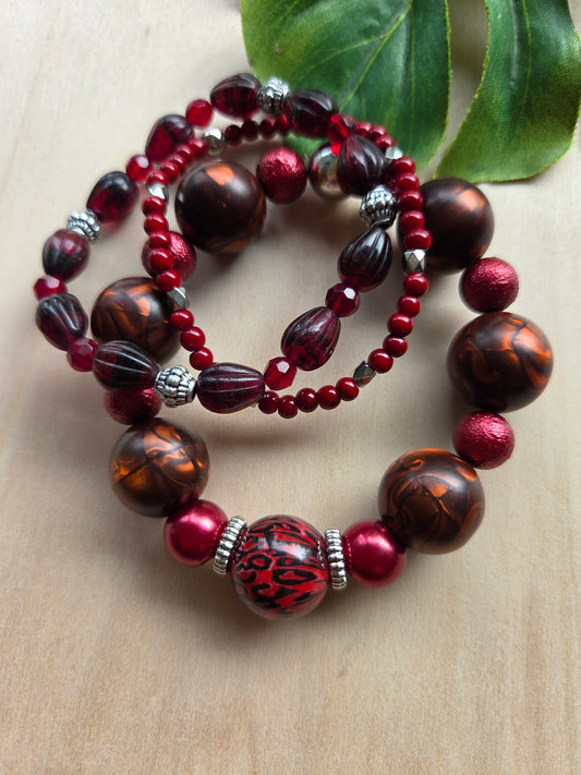 Armbänder mit Leo Kugel rot 3er-Set