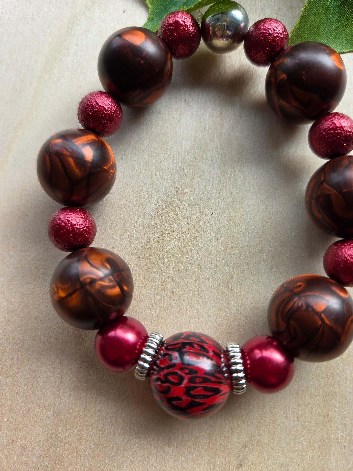 Armbänder mit Leo Kugel rot 3er-Set