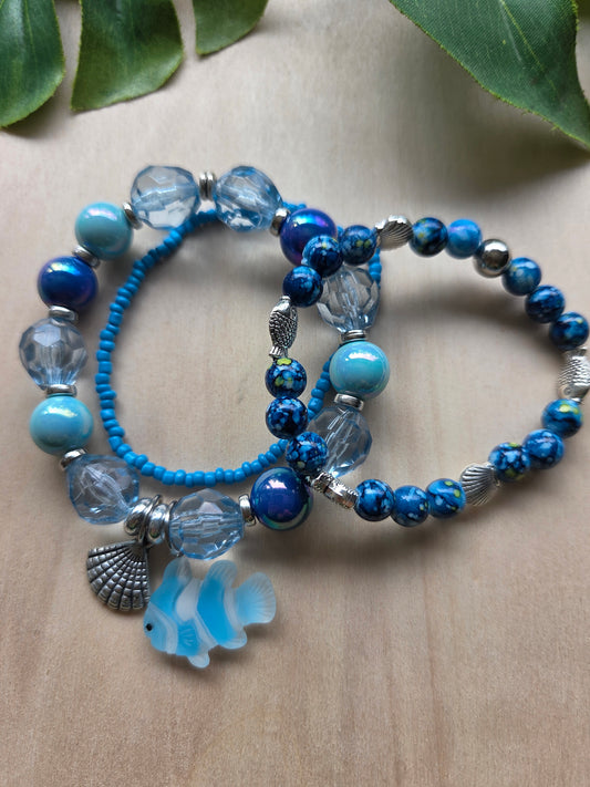 Armbänder mit AH Fisch/Muschel hellblau 3er-Set