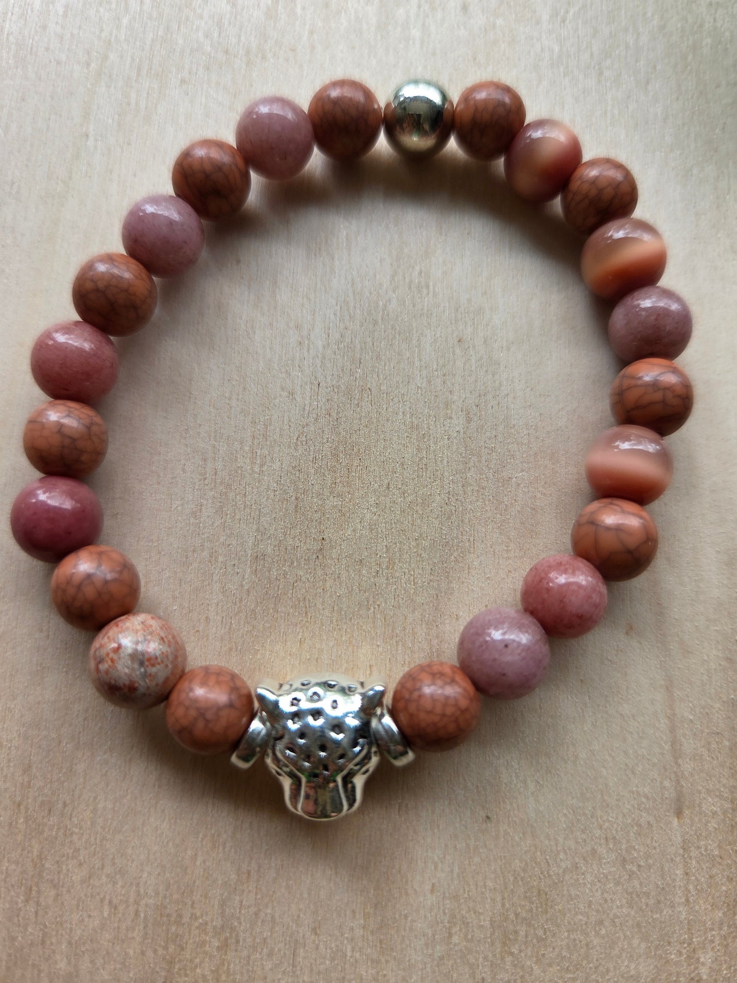 Armbänder braun mit Leo Kopf Perle3 er- Set