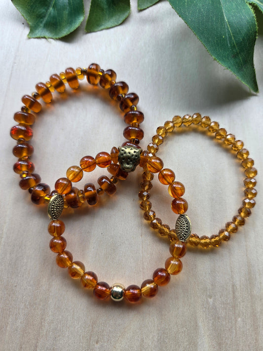 Armbänder mit Leo Kopf Perle braun Glas 3er- Set