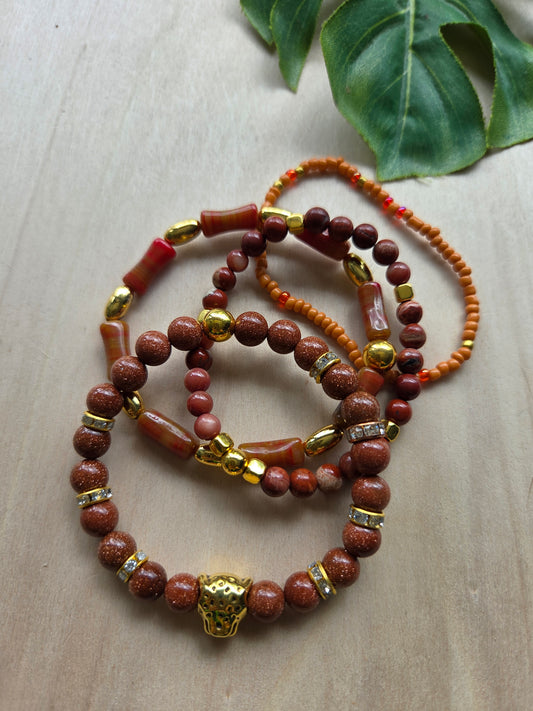 Armbänder braun mit Leo Kugel 4 er- Set