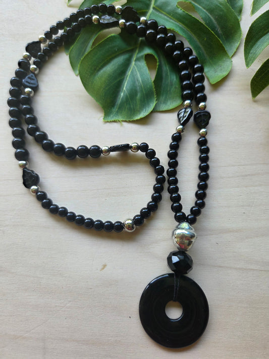 Halskette mit Anhänger Donut schwarz