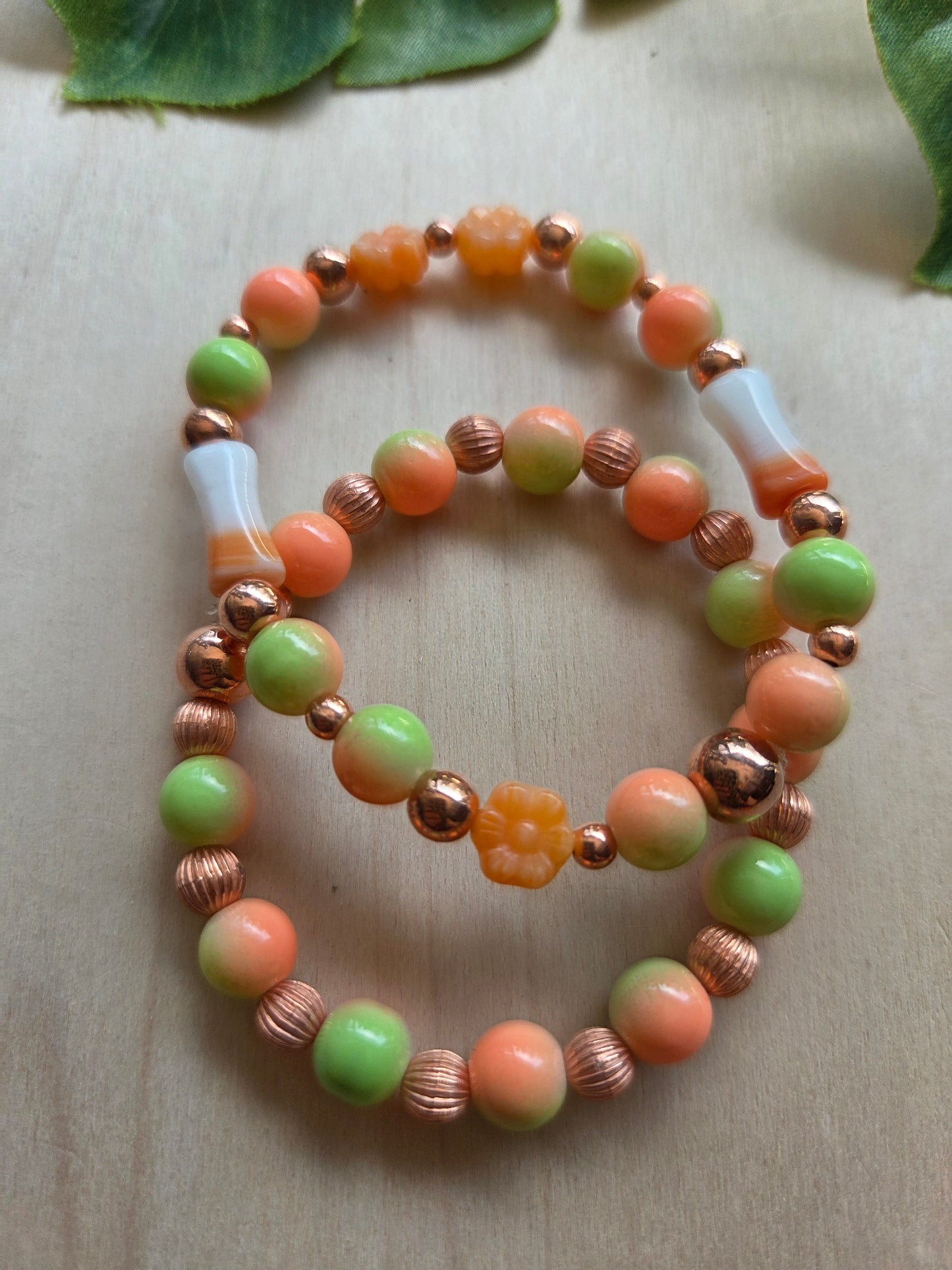 Armbänder Orange  mit Blütenperlen  4 er Set