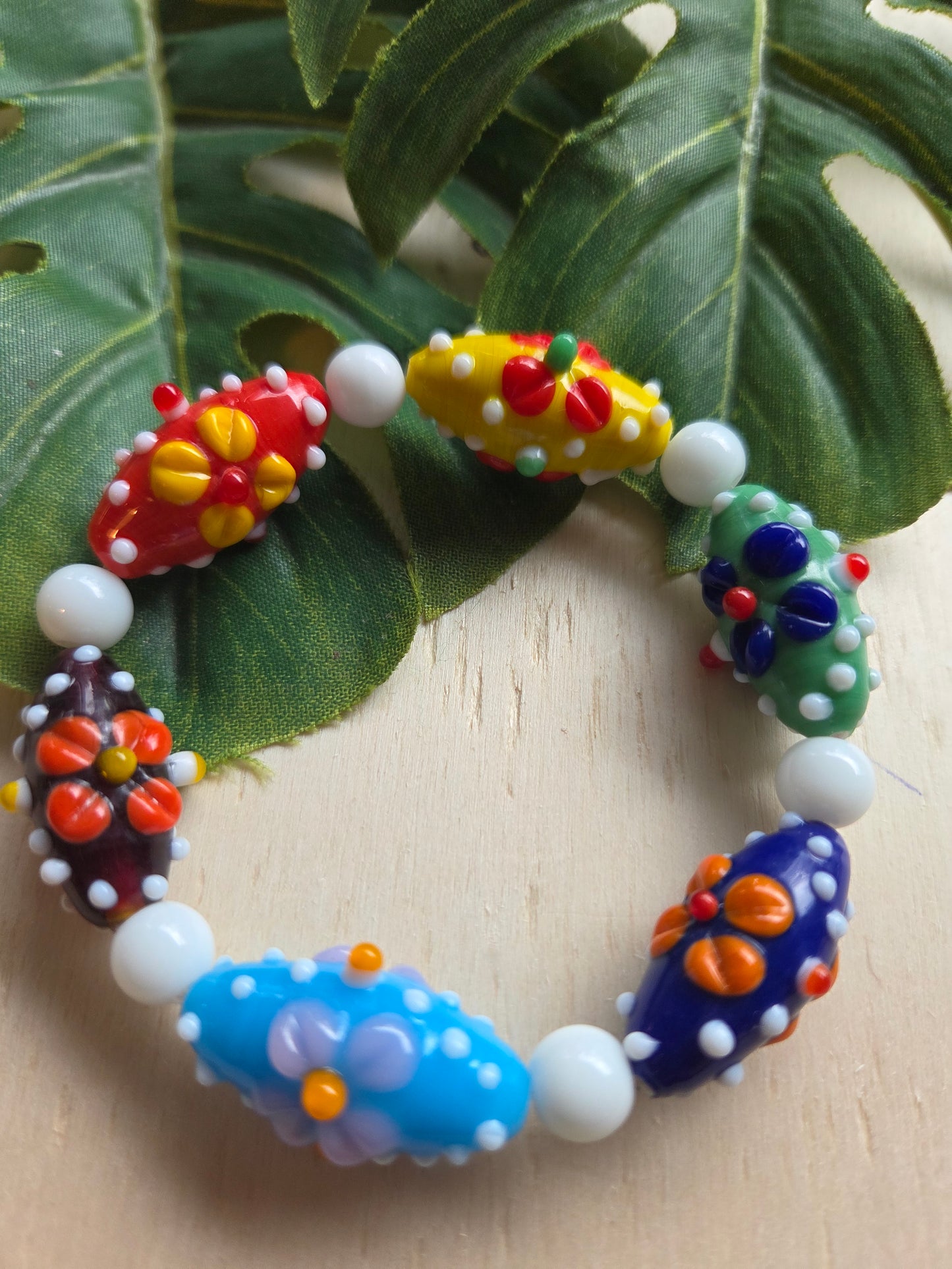 Armbänder weiß/bunt 3er Set  Blütenperlen