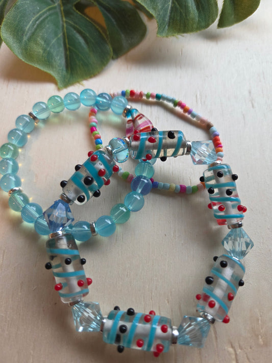 Armbänder 3er Set Perlen klar/blau